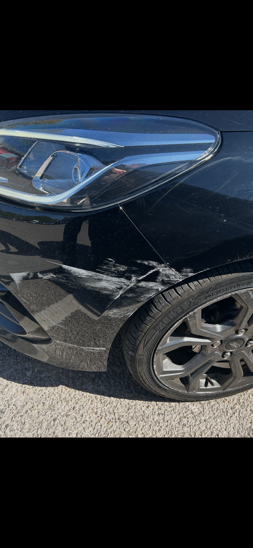 Black Fiesta · arch & bumper damage
